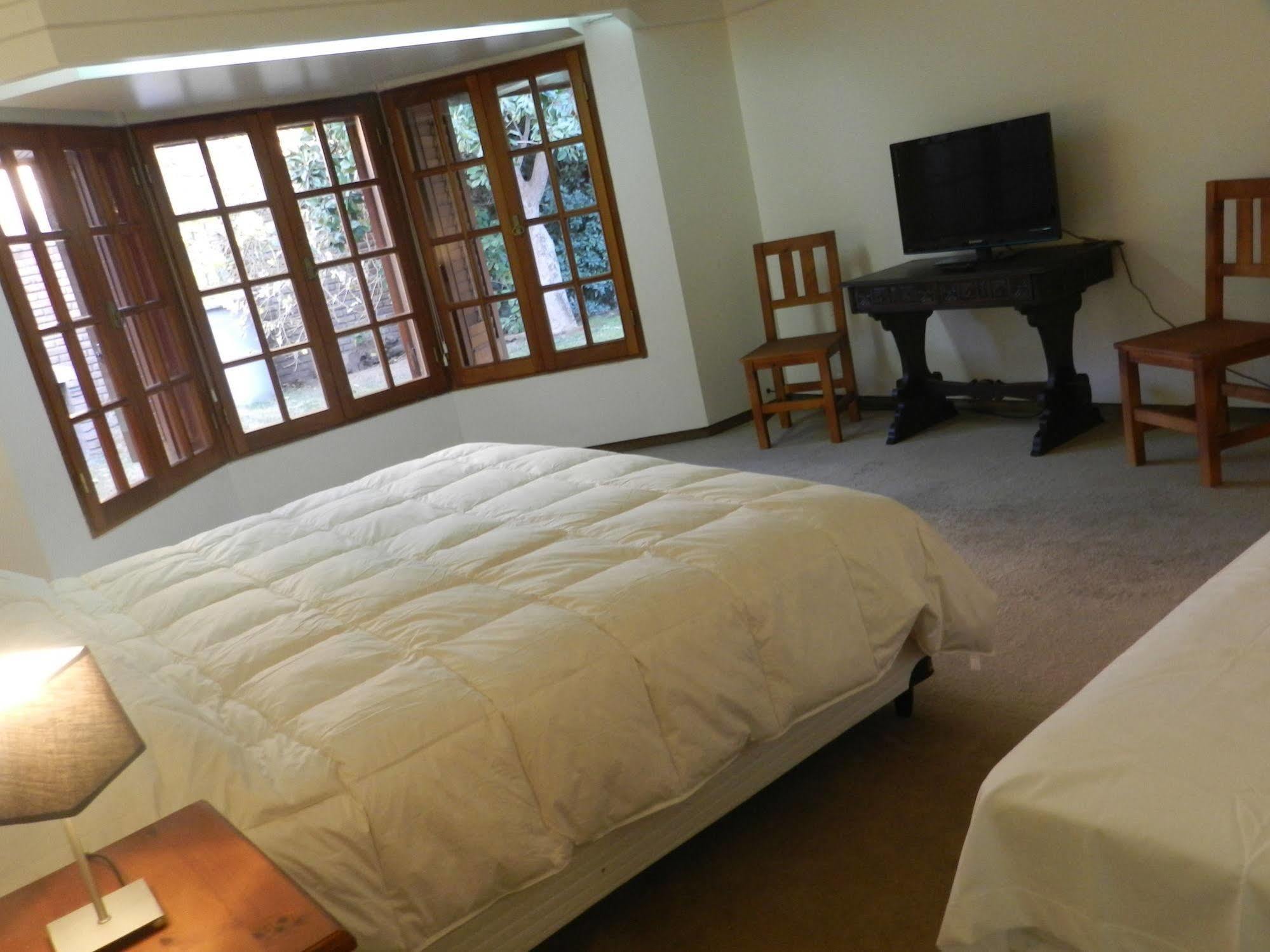 Hôtel La Casona Del Rio à Neuquén Extérieur photo